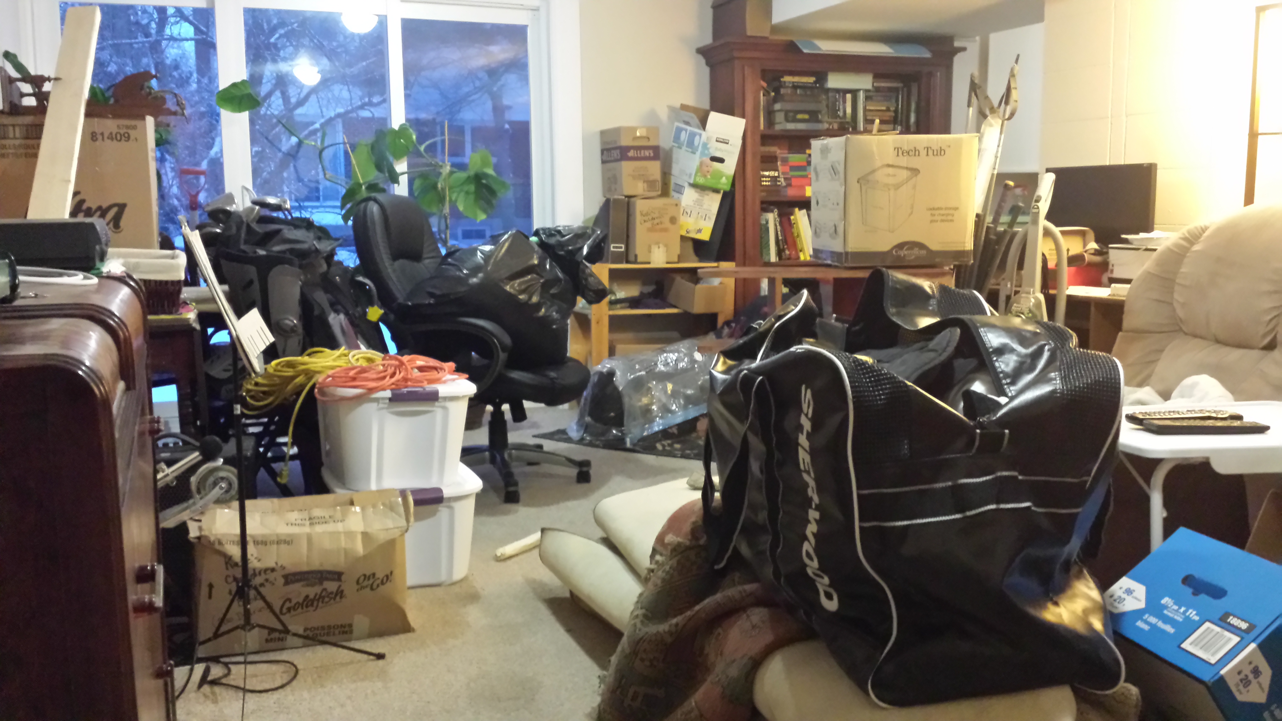 Family room full of storage items